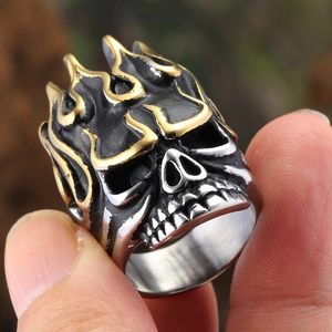 Vintage stainless steel skull ring with gold flame plating and black finish for men
