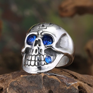 Retro titanium steel skull ring with blue stone eyes and engraved cross detail