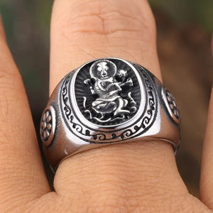 Vintage Tibetan Buddhist ring with silver deity engraving on adjustable stainless steel band