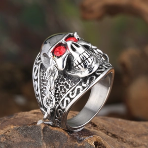 Retro punk skull ring in stainless steel with red zircon eyes and chain detail