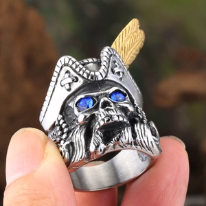 Retro stainless steel pirate skull ring with gold feather and blue crystal eyes