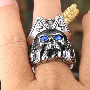 Men's punk pirate skull ring in stainless steel with blue crystals and gold feather