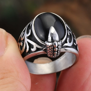 Retro men's stainless steel ring with large black oval gemstone and eagle claw design