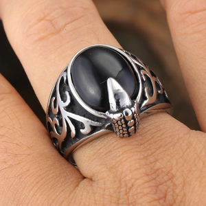 Vintage eagle claw ring for men featuring a black gemstone and silver hollow engraving
