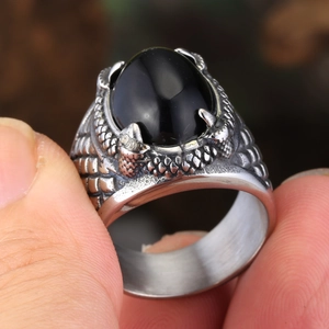 Vintage dragon claw ring with black agate and textured scale band in retro steel finish