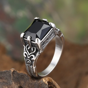 Vintage punk stainless steel ring for men featuring a black gemstone and filigree metalwork