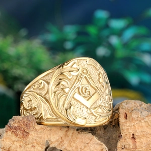 Vintage gold Freemasonry stainless steel ring with G logo and floral carvings on tree bark