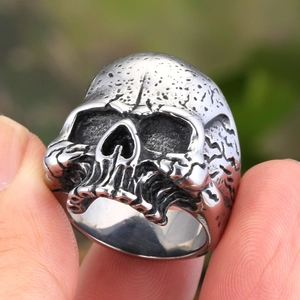 Macro shot of gothic skull ring with vintage finish and industrial textured detailing