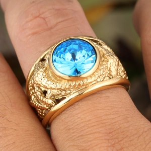 Vintage gold ring for men with dragon scale carving and sky blue round gemstone