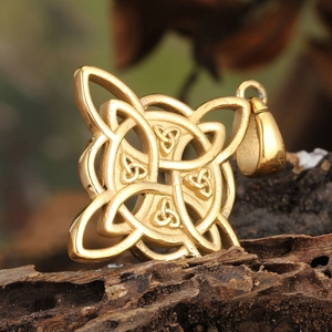 Vintage gold Celtic knot stainless steel pendant necklace on rustic wood background