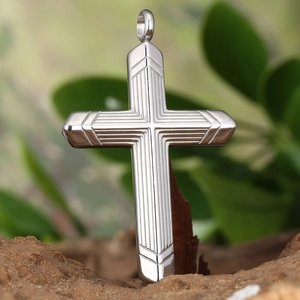 Minimalist silver steel cross necklace pendant with linear engraving on wood