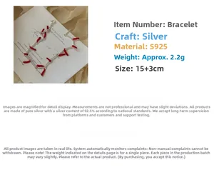 Detailed shot of S925 sterling silver bracelet with red firecracker charm on 15+3cm chain
