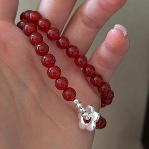 S925 sterling silver beaded bracelet with red agate beads and a small flower pendant