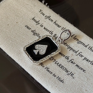 Minimalist S925 sterling silver spade pendant with black enamel and micro-set diamonds