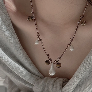 S925 sterling silver drop texture necklace with nomadic style beads on brown woven cord