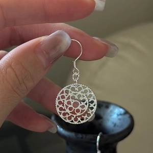Minimalist S925 sterling silver hollow round earrings with intricate filigree floral design