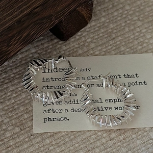 Minimalist S925 sterling silver hoop earrings with a vintage twisted texture design