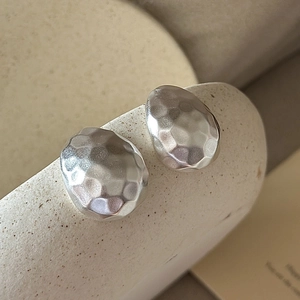 Minimalist S925 sterling silver stud earrings with matte hammered pebble texture
