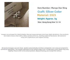 Macro detail of S925 sterling silver star ring featuring polished star-shaped design