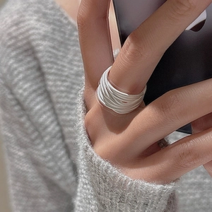 S925 sterling silver multilayer line ring with white resin finish on model finger