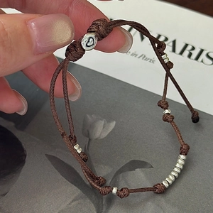 Braunes geflochtenes Armband mit Vintage-Herzperle aus Silber und Schiebeverschluss