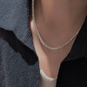 S925 sterling silver woven galaxy necklace for women on dark knit sweater