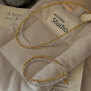 S925 sterling silver beaded bracelet with faceted laser beads in gold and silver finish
