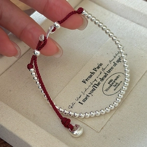 Minimalist S925 sterling silver beaded red rope bracelet with a round pendant in a gift box