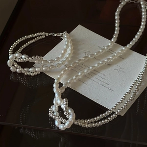Ensemble de bijoux élégants en argent S925 et perles d'eau douce avec design nœud