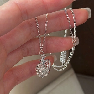 S925 sterling silver heart necklace featuring woven wire pendant and double chain design