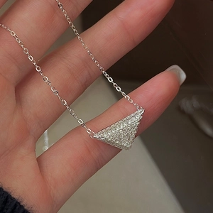 Minimalist S925 sterling silver necklace featuring a sparkling zircon triangle pendant