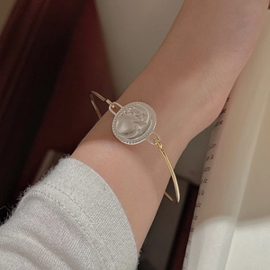 Retro S925 silver and gold two-tone bangle featuring a vintage portrait relief coin