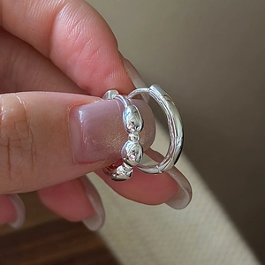 Minimalist S925 sterling silver hoop earrings set with smooth and textured lava designs