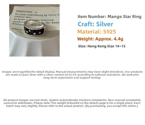 Detailed view of S925 sterling silver wide band ring with black enamel and star patterns