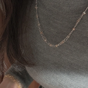 Elegant S925 sterling silver multilayer lace necklace with brown beads on model