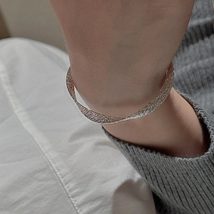 Detailed view of S925 sterling silver woven cuff bracelet with intricate mesh texture