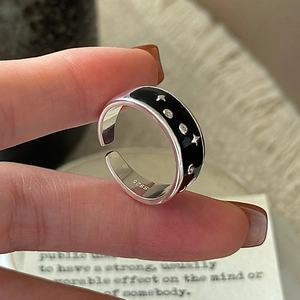 Chic S925 sterling silver open ring featuring black enamel and sparkling star patterns
