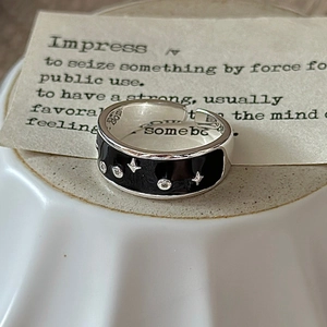 Adjustable S925 sterling silver ring with black enamel star pattern and fine gemstones