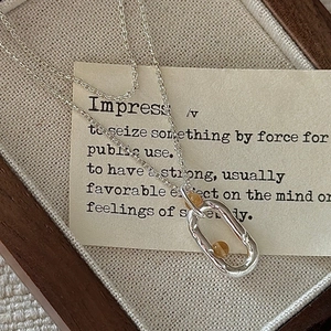 S925 silver necklace featuring irregular textured oval pendant with citrine amber beads