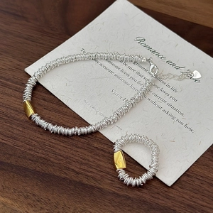 Ensemble bijoux en argent sterling S925 avec bague torsadée et bracelet à détails dorés