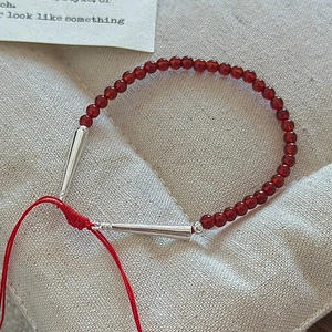 Handmade S925 silver beaded bracelet with red agate stones and adjustable woven cord