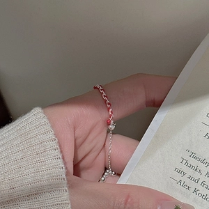 Adjustable S925 sterling silver and red woven rope chain ring for a minimalist retro look