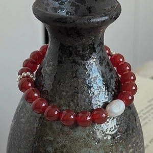S925 sterling silver beaded bracelet with red agate beads and a baroque pearl detail