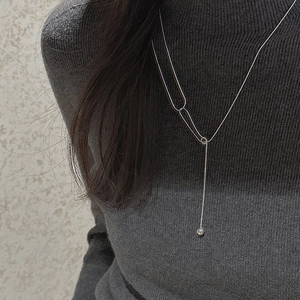 S925 sterling silver minimalist Y-shaped necklace with oval rings and a small polished bead