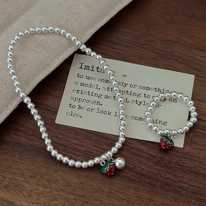 Set bracciale e anello in argento S925 con ciondolo a fragola e perline smaltate