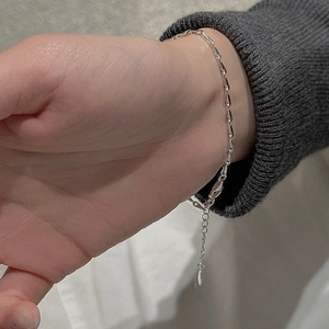 Minimalist S925 sterling silver chain bracelet with adjustable extender on female wrist