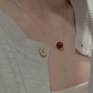 Vintage S925 sterling silver chain necklace with a glossy deep red round bead pendant