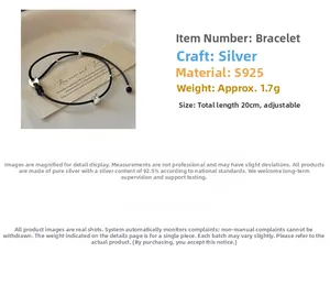 Détails des perles en argent S925 ajustables sur un bracelet en cuir tressé noir