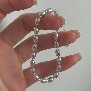 Minimalist S925 sterling silver beaded bracelet with polished oval links and lobster clasp