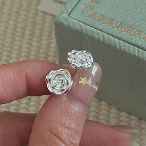 S925 sterling silver rose stud earrings with detailed 3D petals and polished finish